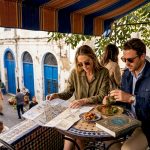 Travelers at Tangier street café in medina